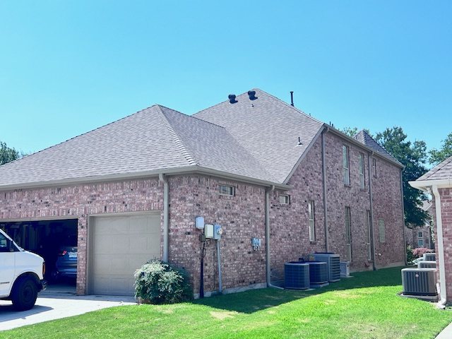 Brick Home Roofing by TRC in North Texas